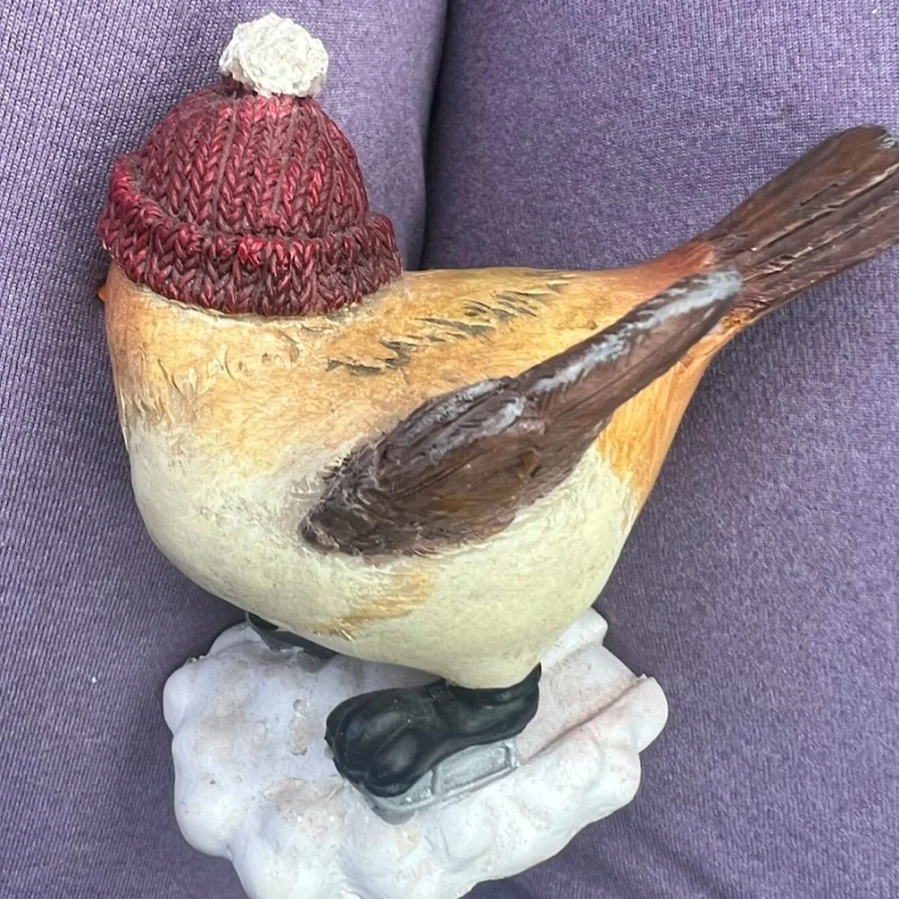 Adorable Small Bird figurine With Winter Hat And Ice Skates. In good condition.